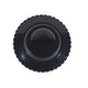 Black wheel with tread pattern on a white background