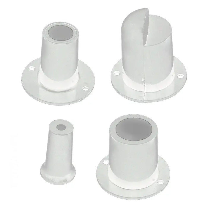 Four white plastic connectors on a white background