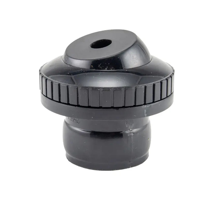 Black plastic component on a white background