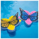 Two butterfly-shaped objects, one yellow and one blue with pink body, on a blue background.