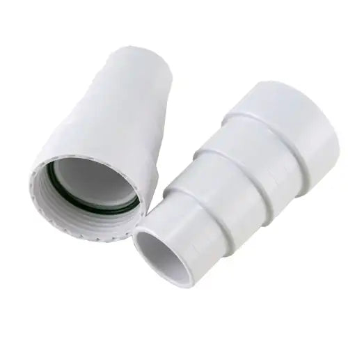 Two white plastic pipe connectors on a white background