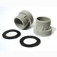 Plumbing fittings including two gray pipe connectors and two black washers on a white background