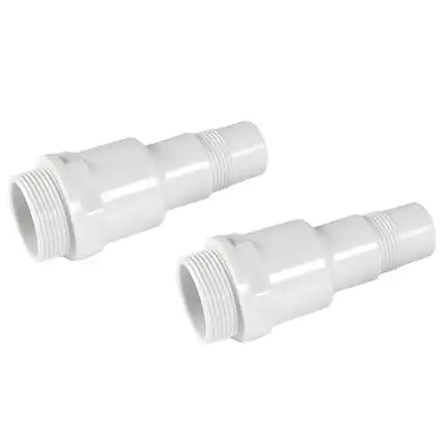 Two white plastic plumbing connectors on a white background