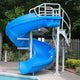 Blue water slide with metal structure near a pool