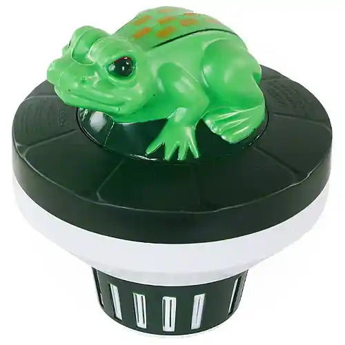 Green frog-shaped object on a black and white base