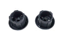 Two black plastic components on a white background