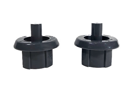 Two black plastic components on a white background