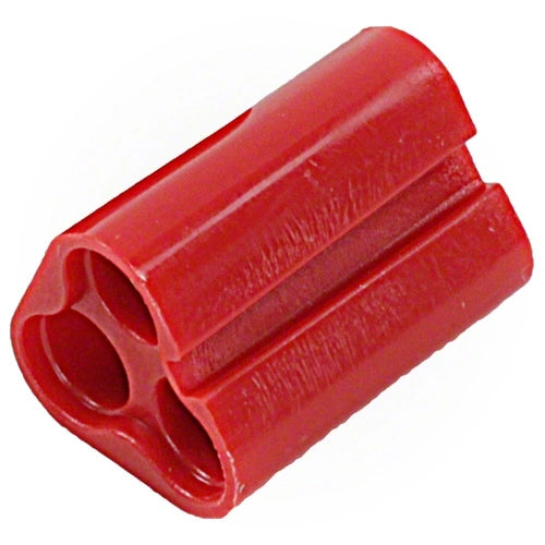 Red plastic component on a white background