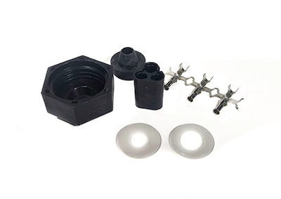 Set of mechanical components including a hexagonal block, cylindrical parts, and metal brackets on a white background.