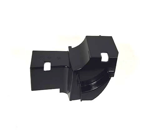 Black plastic component on a white background