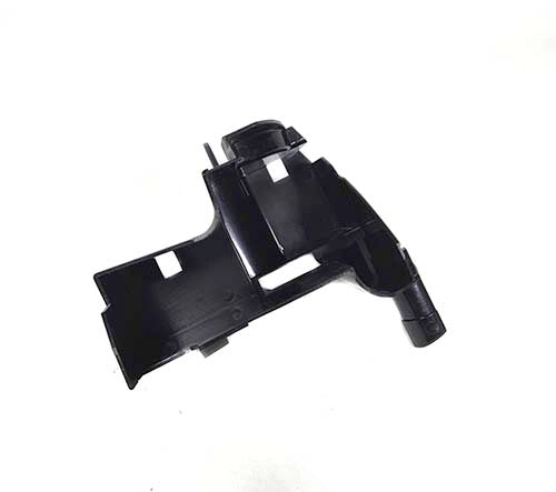 Black mechanical component on a white background