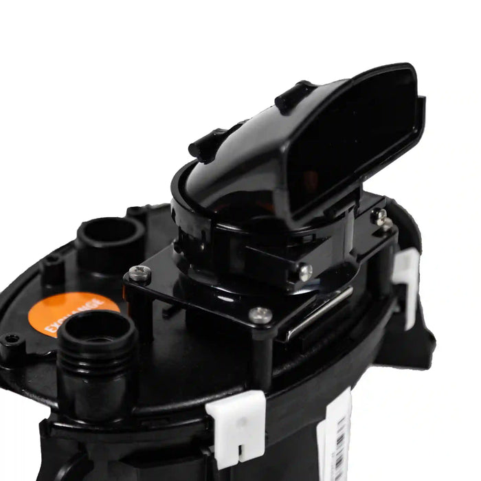Close-up of a black mechanical component with an orange label on a white background