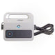 White electronic device with power cord on a white background