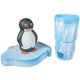 Penguin figure with sunglasses on an ice block next to a stack of blue cups.