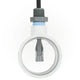 Close-up of a white circular component with a metal rod and threaded fitting on a white background
