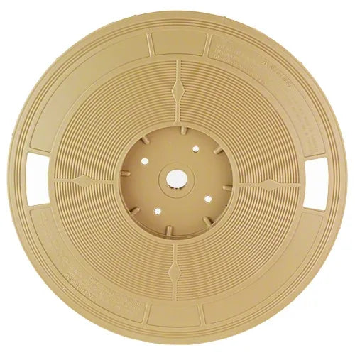 Beige spool with circular pattern on a white background
