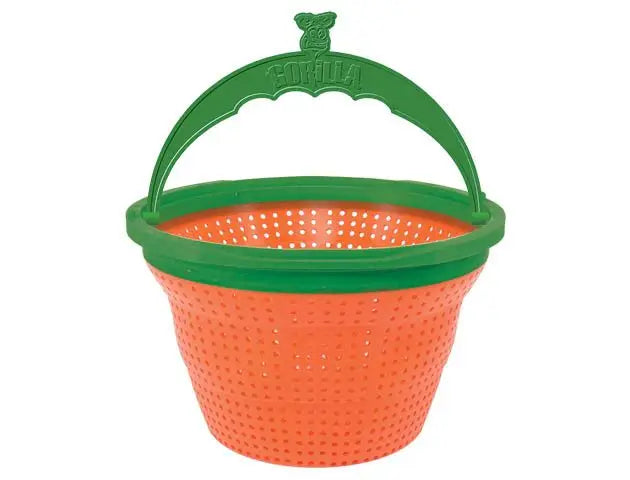 Orange colander with green handle on a white background