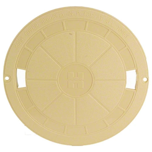 Round beige manhole cover with embossed text on a white background