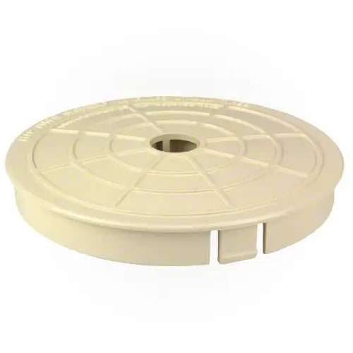 Beige plastic component on a white background